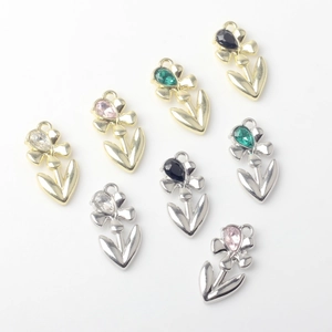 Alloy tulip flower pendants with water drop rhinestones in gold and silver finish