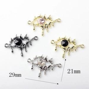 Lava style eye pendant connectors in various metal finishes with crystal centerpieces