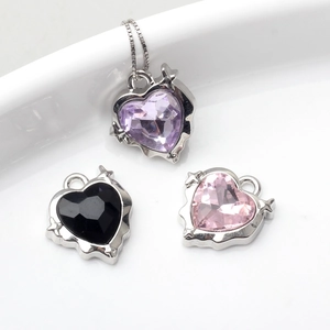 Alloy heart pendant set with faceted gems and star-detail base for jewelry making