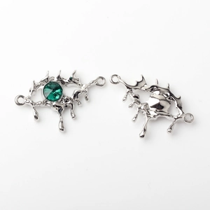 Silver lava style eye charm with green gemstone for DIY jewelry making and earring design