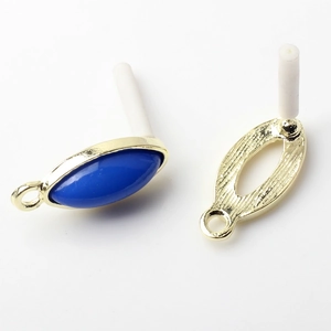 Detailed macro view of vintage oval alloy earring studs for DIY jewelry making