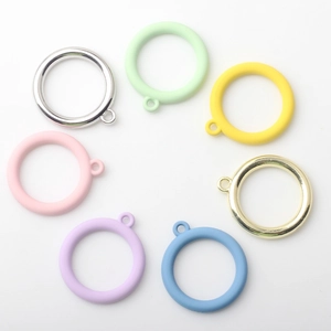 Colorful alloy round hollow charms in seven vibrant colors for DIY earring jewelry making