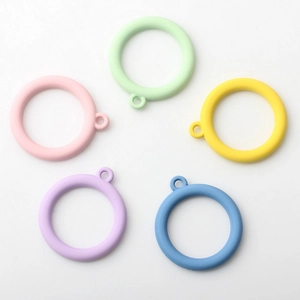 Colorful matte alloy hollow round charms in five macaron colors for DIY jewelry making
