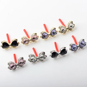 Bow-shaped crystal pendants with heart-shaped stones for DIY jewelry making