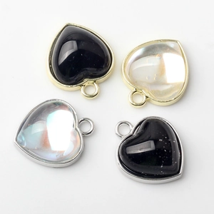 DIY heart pendants with gold and silver alloy frames and rhinestone accents