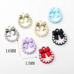Mini breloques nœuds 16x13mm avec perles et strass pour la création de bijoux DIY