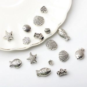 Set de dijes de aleación plata antigua para joyas DIY con formas de estrella y corazón