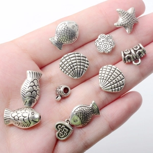 Cuentas y dijes vintage de aleación plateada tema océano para creación de joyas DIY