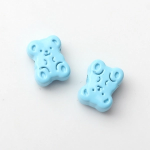 Macro detail van hemelblauwe beer kralen van legering voor DIY sieraden accessoires
