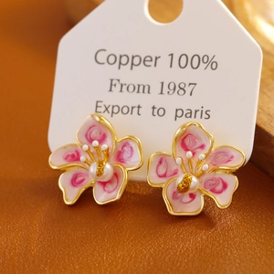 Pink enamel cherry blossom earrings in copper with central faux pearl accents