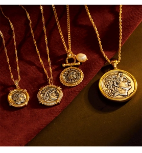 French vintage coin necklace set with pearl details and classical gold portrait reliefs