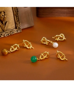 Détails de boucles d'oreilles nœud doré avec perles vertes et perles blanches vintage