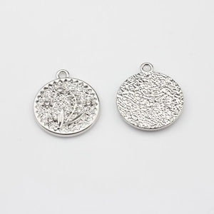 Silver flower pendant with lily of the valley relief and rhinestones on both sides