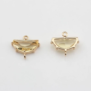 Detailed view of semi-circle gold-plated crystal charms for DIY jewelry making