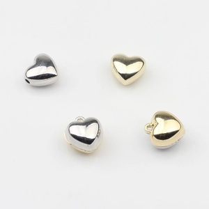 Polished silver and gold heart pendants and slider beads for DIY jewelry making