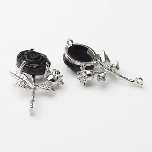 Detailed view showing the front and back of a 3D black rose alloy pendant accessory