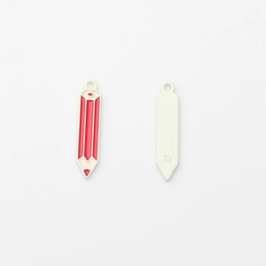 Macro shot of red pencil alloy pendants showing detailed front and back with L letter