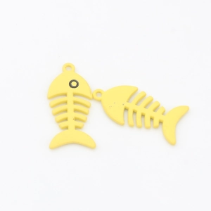 Detailed view of yellow matte fishbone charms for DIY jewelry making accessories
