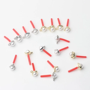 DIY jewelry pendants with faux pearls and gold/silver geometric metal bases for earrings