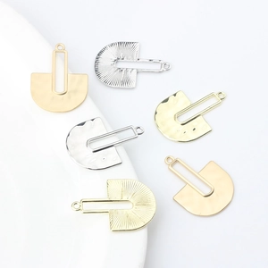 Geometric fan-shaped hollow metal pendants in gold and silver for DIY jewelry making