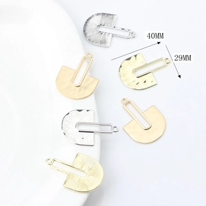 Geometric fan-shaped hollow metal pendants in gold and silver finish for DIY jewelry