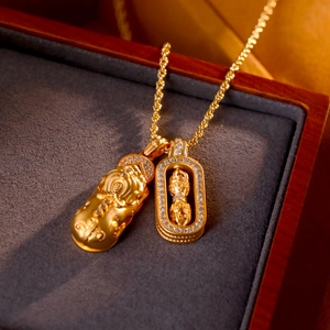 Golden PiXiu and Vajra pendant necklace with sparkling crystals on a twisted rope chain