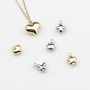 Set de mini dijes de aleación de corazón estrella mariposa para joyería artesanal