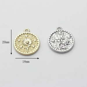 Set of 20mm gold and silver round coin flower pendants with intricate daisy engraving