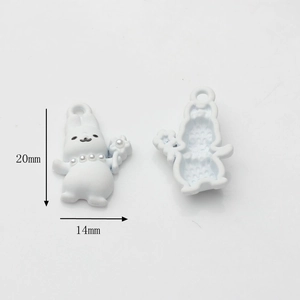 Macro detail of white rabbit charm pendant with dimensions 20mm by 14mm for DIY jewelry