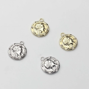 Vintage muntbedeltjes met portret en strass in goud en zilver voor DIY sieraden