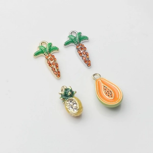 Enamel fruit pendants including rhinestone carrots, papaya, and pineapple for DIY jewelry