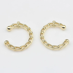 Detailed view of golden semi-circular chain link alloy pendant connectors for earrings
