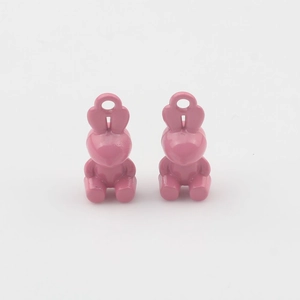 Detail of pink bunny charms for DIY jewelry making with top hole for pendants