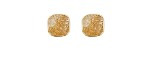 Detailed view of square gold-framed earrings featuring textured amber resin crystals