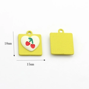 Detail view of yellow square cherry heart charms showing dimensions 18mm by 15mm