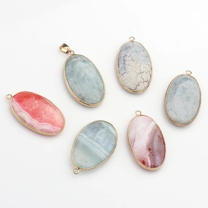 Set of six oval agate stone pendants with gold plating and natural dragon vein textures