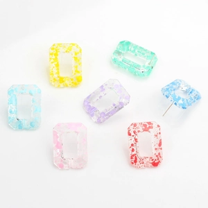 Colorful rectangular resin chain earrings with artistic paint splatter texture dots
