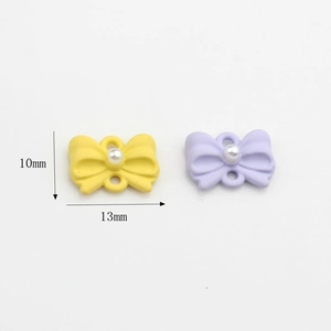 Pendente mini fiocco con perla in giallo e viola, componenti per gioielli fai da te