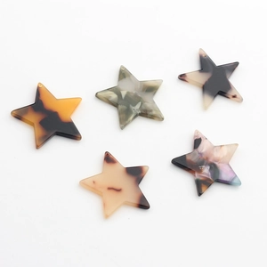 Pentagram star-shaped acetate resin charms in assorted amber and marble patterns for DIY jewelry