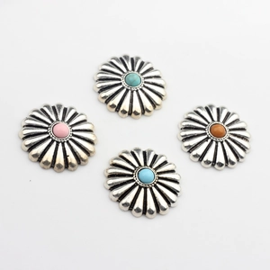 Detailed view of vintage daisy flower alloy conchos with colorful resin centers for DIY crafts