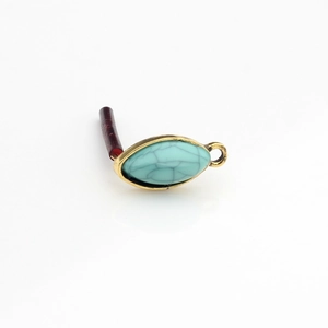 Detailed view of vintage gold marquise turquoise pendant for DIY jewelry making