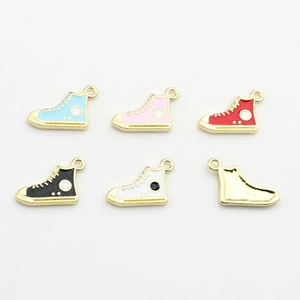 Detailed close-up of mini alloy canvas shoe pendants in various colors for DIY jewelry