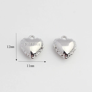 Detailed view of silver heart pendant with Sweetie engraving and 12mm size measurement