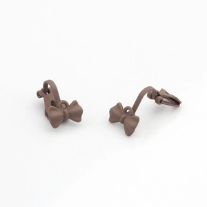 Detail of chocolate brown matte bow ear clip converters with U-shaped clip design