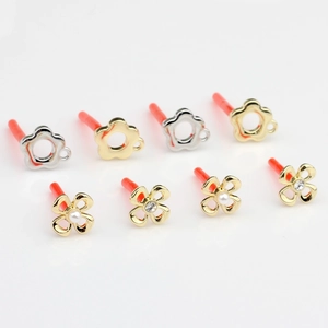 Elegant floral stud earrings featuring pearls and zircons in gold and silver finishes