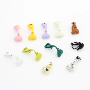 Colorful heart-shaped clip-on earrings in matte paint and polished metallic finishes