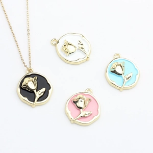 Enamel rose flower circle pendants on gold chains in black, white, blue, and pink sets