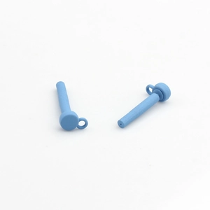 Macro view of matte blue round stud earring components with loop for DIY jewelry making