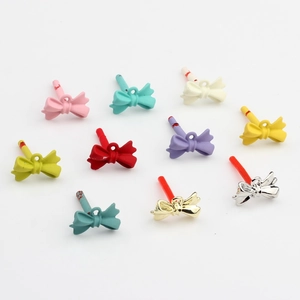 Set of 10 colorful mini bow earring charms with matte finish and metal hooks for DIY jewelry