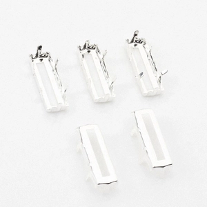 Silver rectangle claw settings for DIY jewelry with multi-prong design on white background